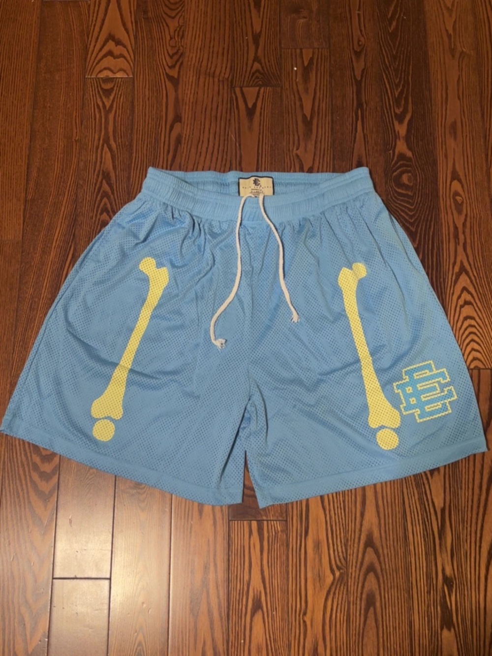 Eric Emanuel Light Blue Mesh Shorts with Yellow Graphics